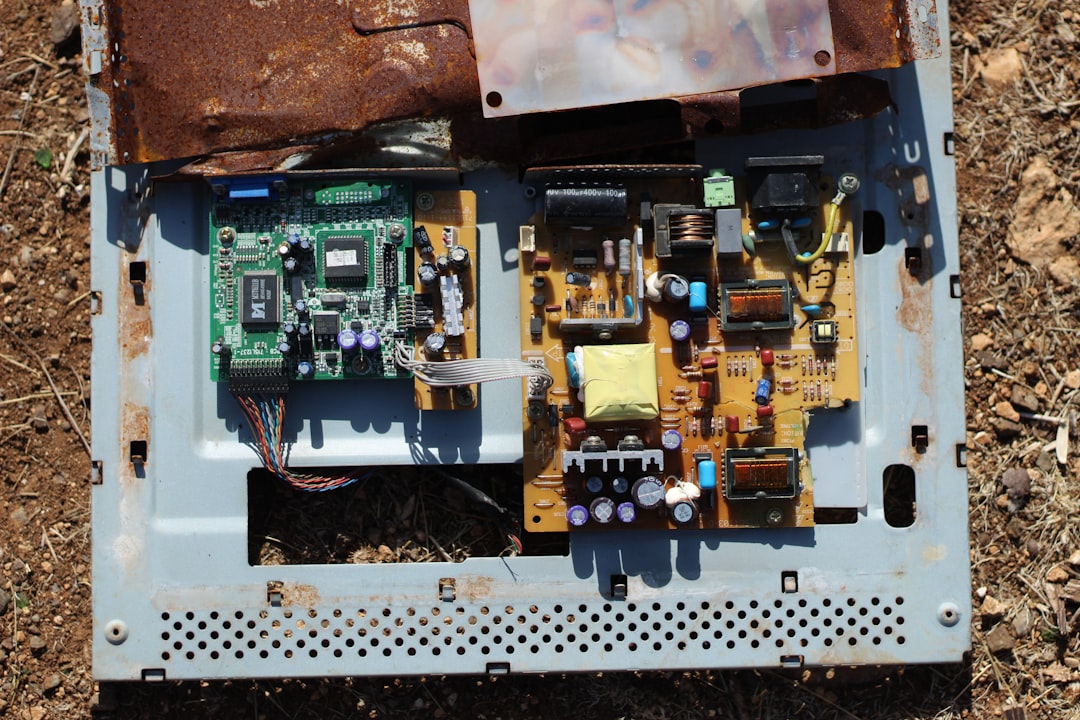 discarded-electronic-circuit-boards-on-the-ground-4orza3kwbiw